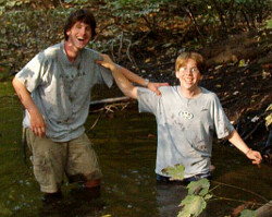 river hiking fully clothed