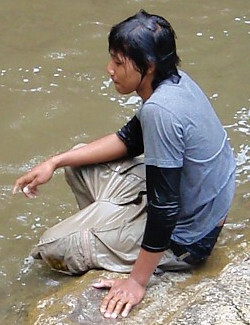 river hiking fully clothed